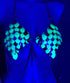 metal scale bra with glowing green and silver scales and hanging chains under blue lighting, edgy and bold