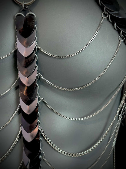 metal chain armor with alternating black and gray scales, sleek and strong, evoking power