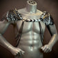 metal scale shoulder armor in black and silver with chains, futuristic style, bold and fierce