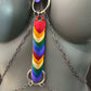 Body chain with multicolor heart-shaped leather pieces and silver metal chains, vibrant and edgy style
