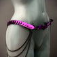 purple metal chain belt with scales on mannequin hip, edgy fashion, bold style, confident vibe