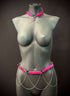 body chain jewelry in pink and silver on gray mannequin, edgy and bold style, confident vibes