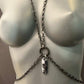 metal body chain jewelry in silver-gray with oval links and pendant, edgy and bold style