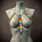 Rainbow chain body harness with metal rings and colorful scales, bold and vibrant style, expressive and playful
