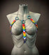 Rainbow chain body harness with metal rings and colorful scales, bold and vibrant style, expressive and playful
