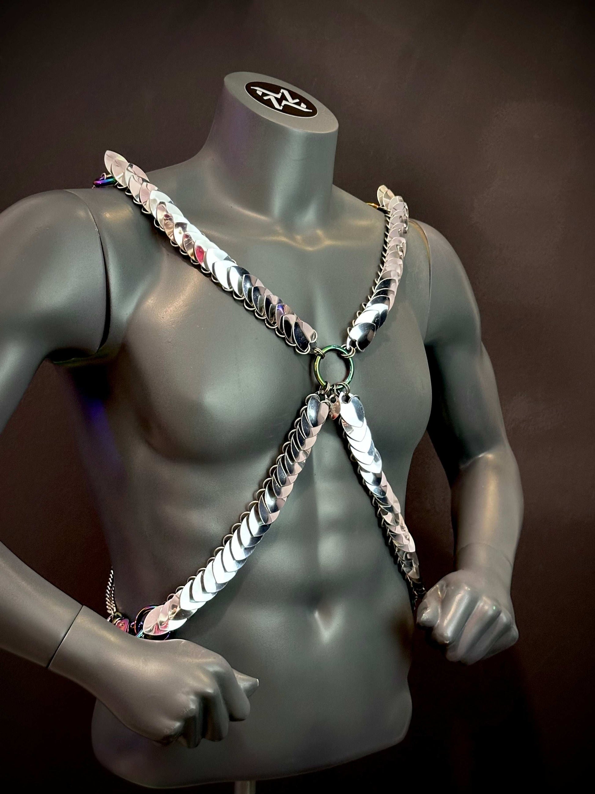 silver metallic harness on gray mannequin torso with confident pose