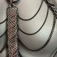 Silver chain necklace with black mesh-patterned scales, stylish and edgy design