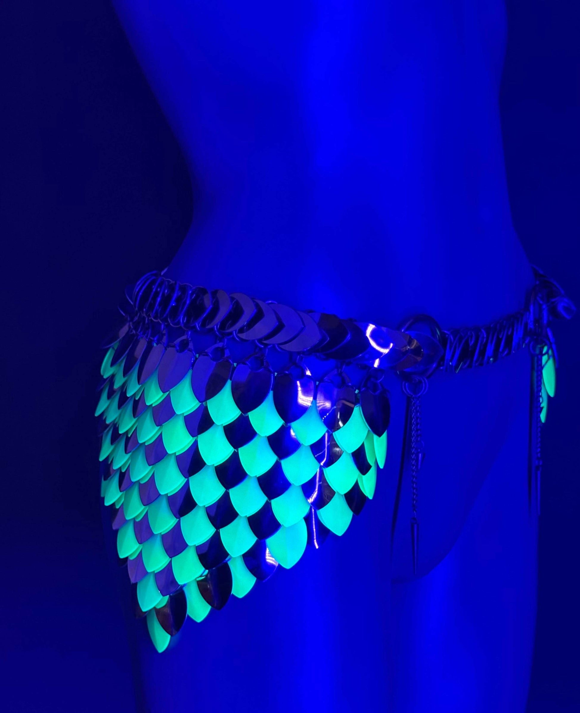 metal scale chain belt with glowing green and silver scales, futuristic and bold style