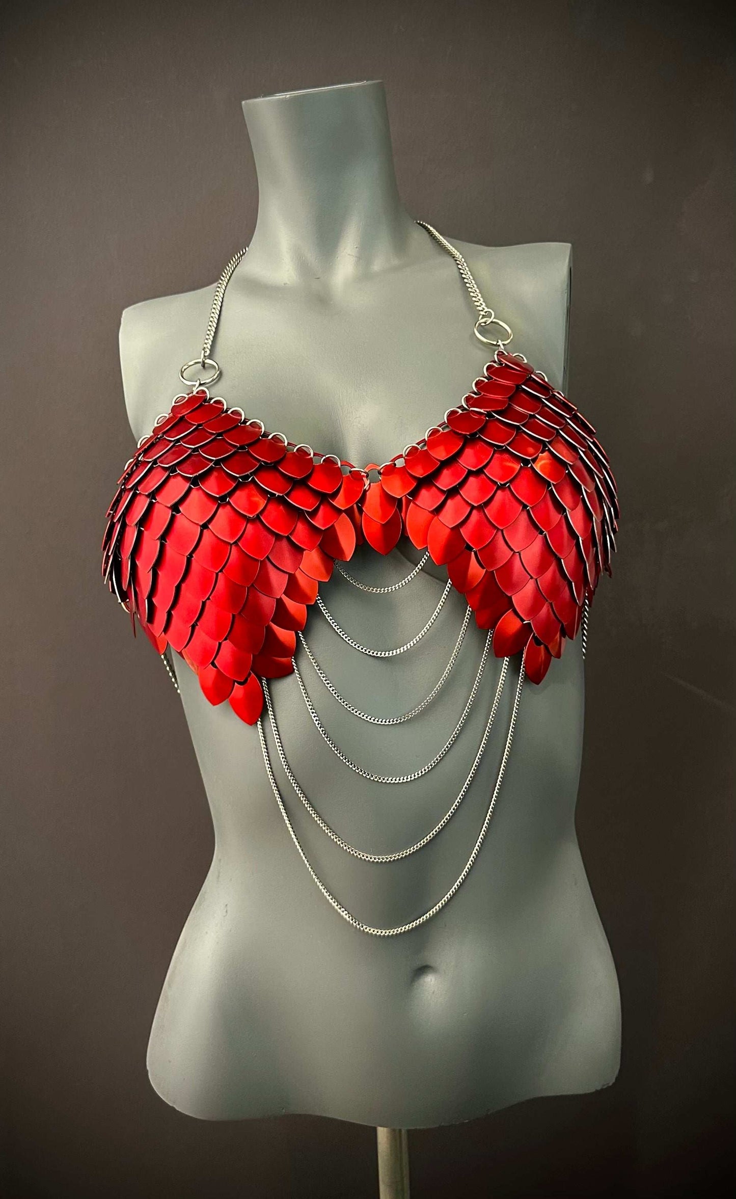 metal scale bra red with silver chains, edgy style, bold and confident