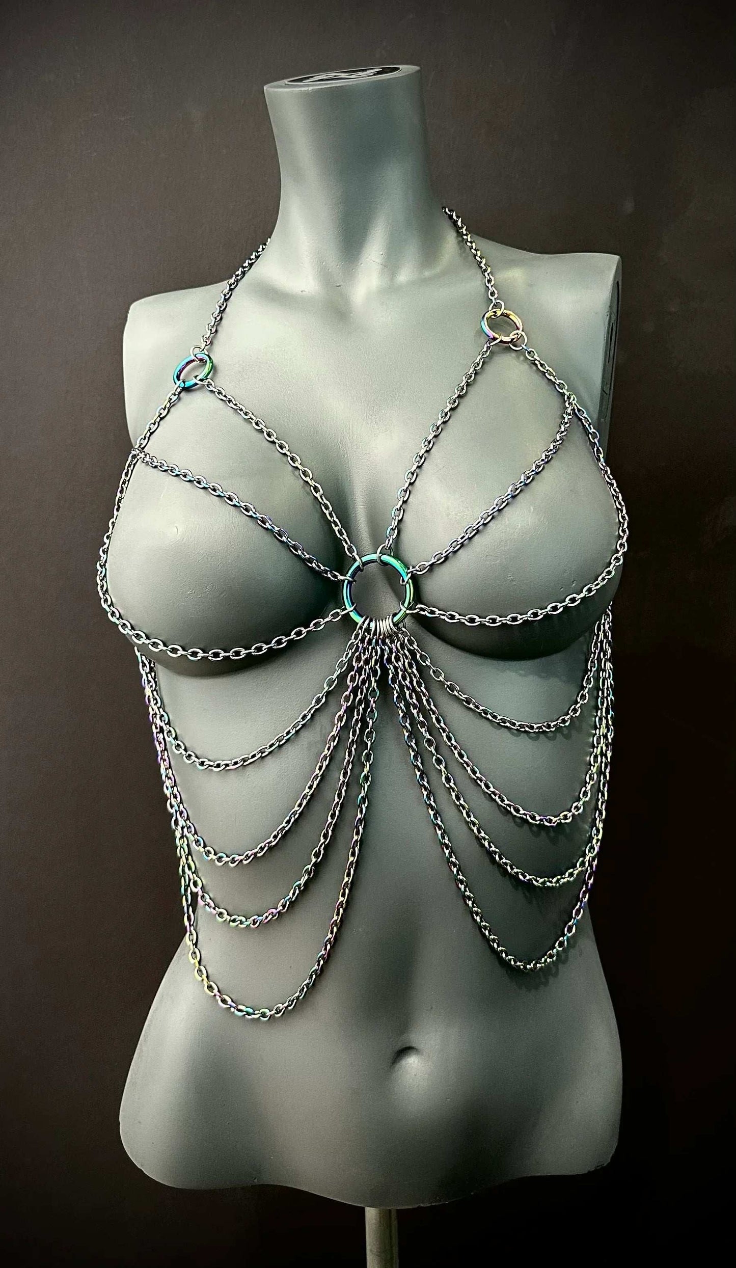 chain body jewelry, multicolor metal, edgy style, bold and confident