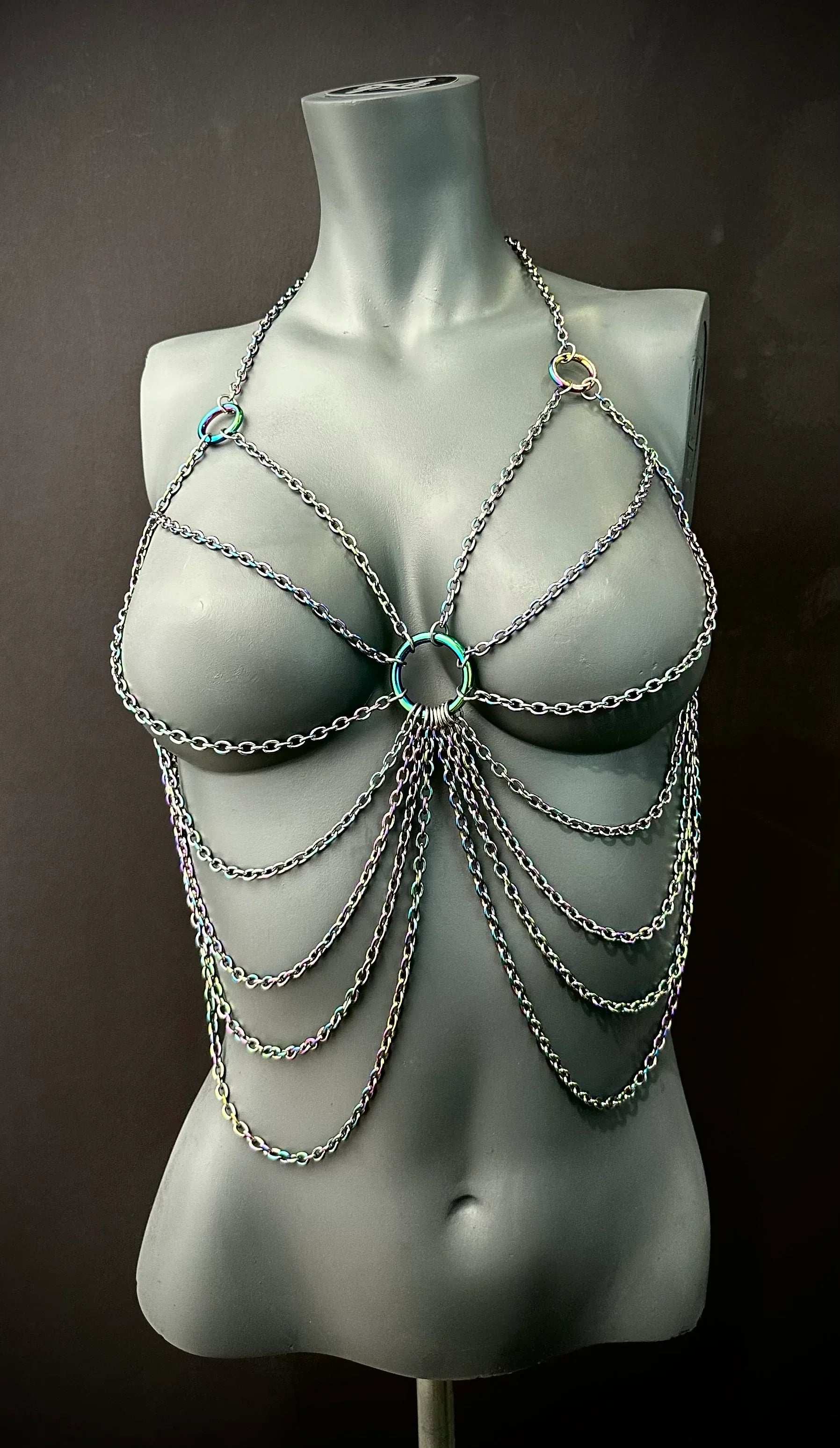 chain body jewelry, multicolor metal, edgy style, bold and confident