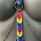 Rainbow heart charm silver chain necklace on gray mannequin, vibrant and stylish, expressive and joyful